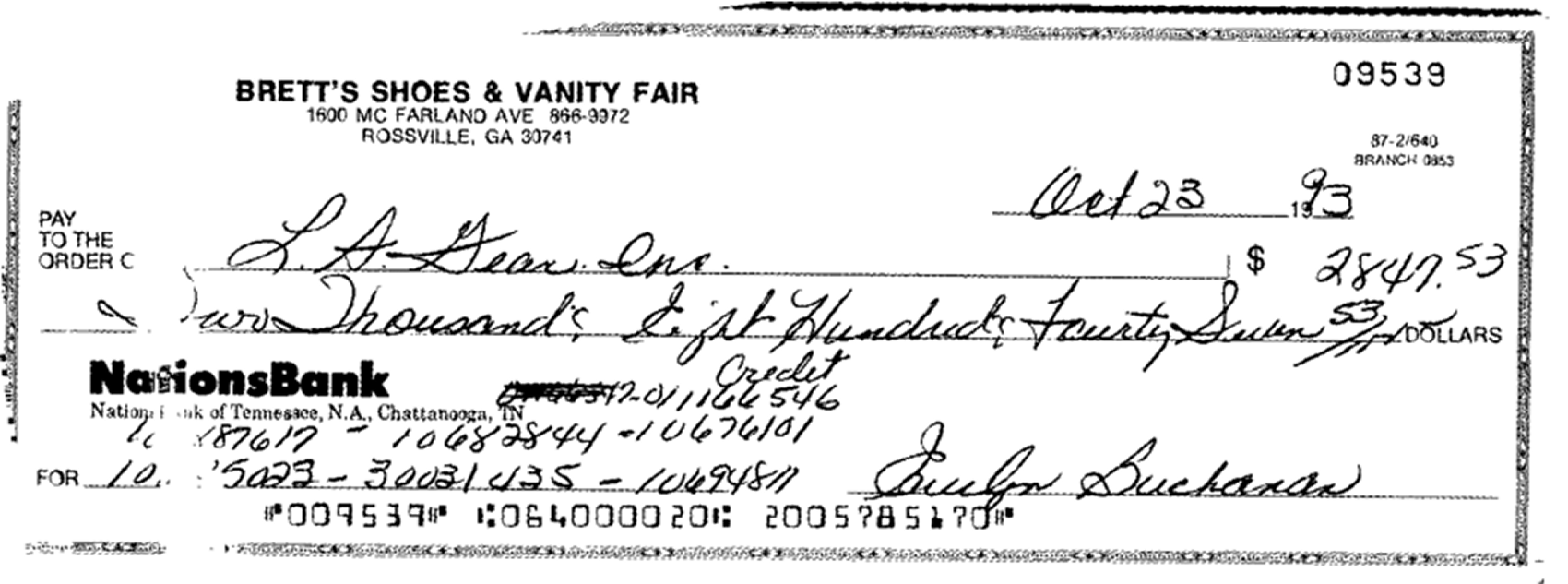 A scanned handwritten check, the kind of messy source document Conto reads